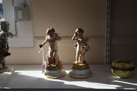 Two Meissen figures of Cupid, circa 1900, 20 cm and 21cm